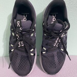 On Running Charcoal and White Athletic Shoes